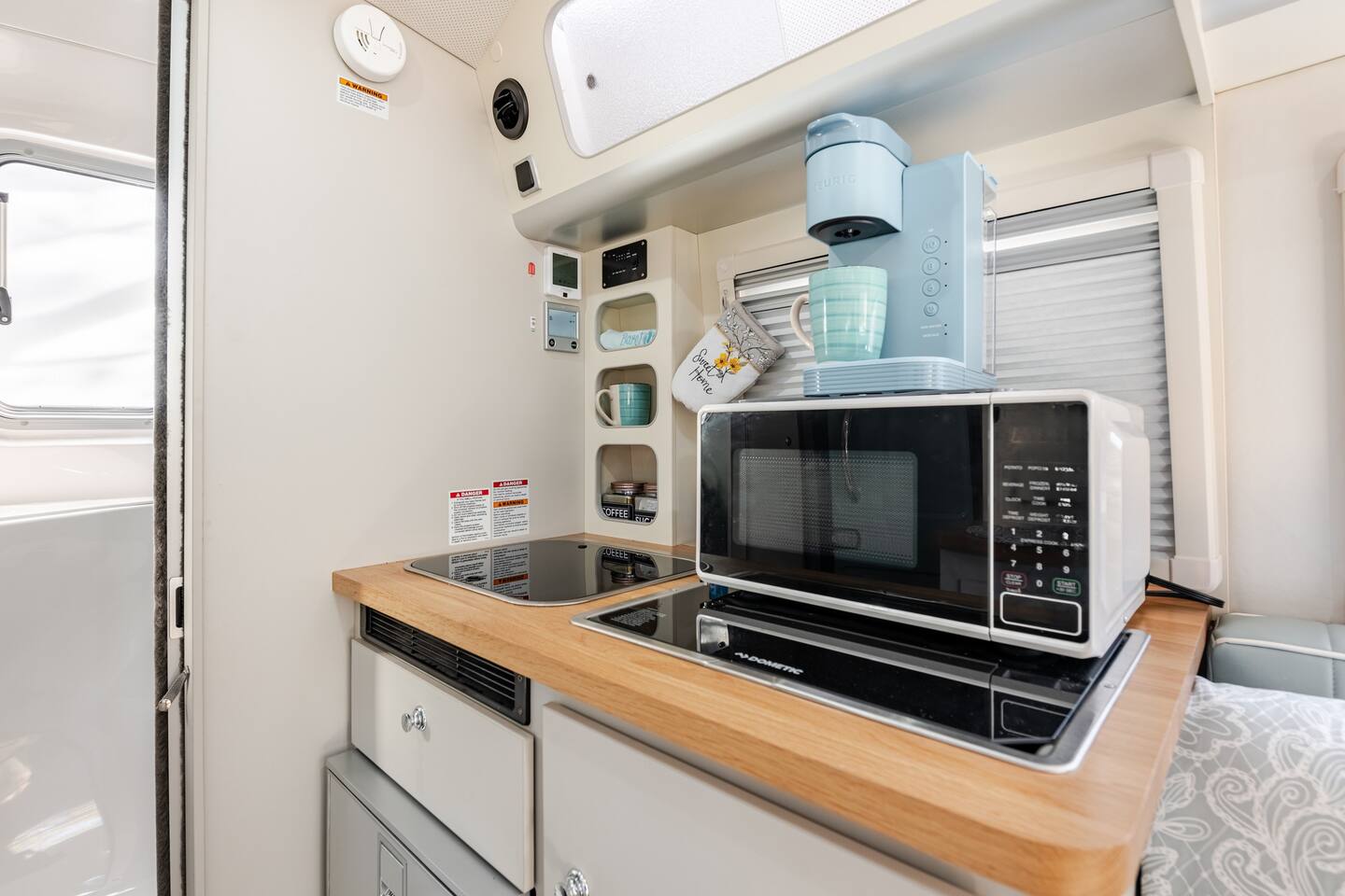 Complete kitchen with microwave and storage